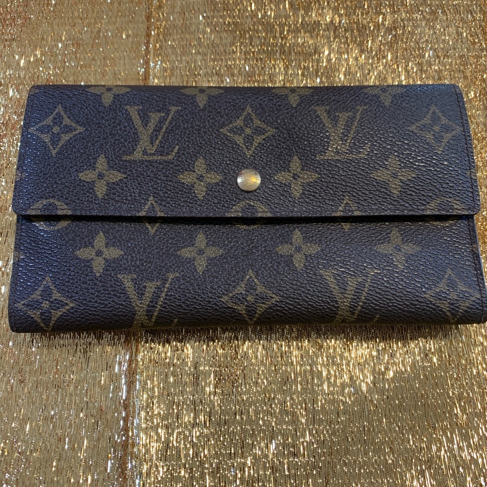 Louis Vuitton International Trifold Long Wallet.